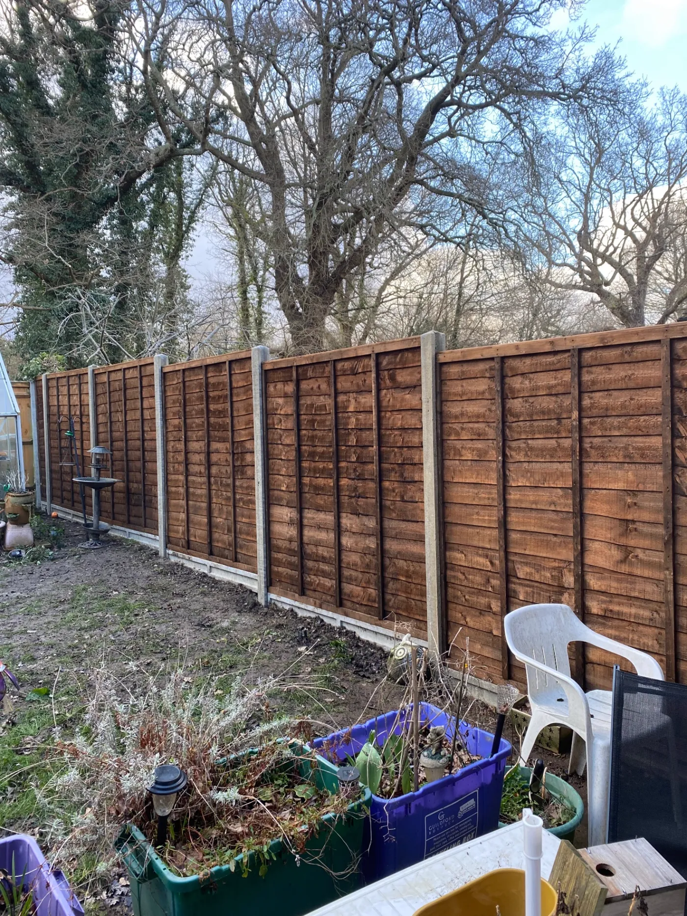 Lap garden fence panels replaced at the back of a garden